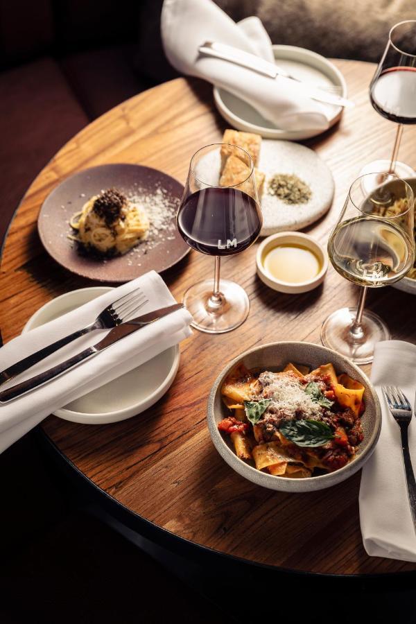 Next Hotel Melbourne, Curio Collection By Hilton Екстериор снимка A selection of dishes at the restaurant